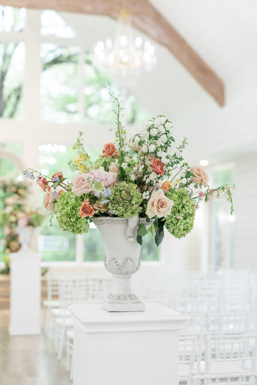 blush wedding ceremony flowers
