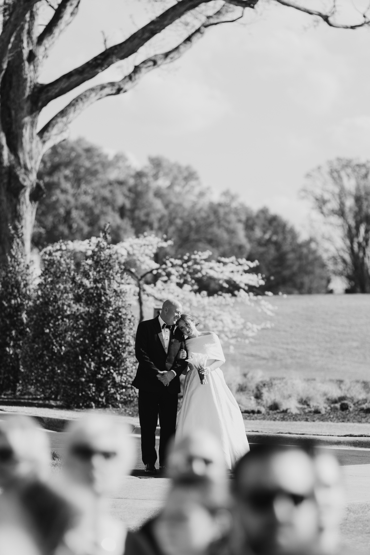 father walking bride down the aisle