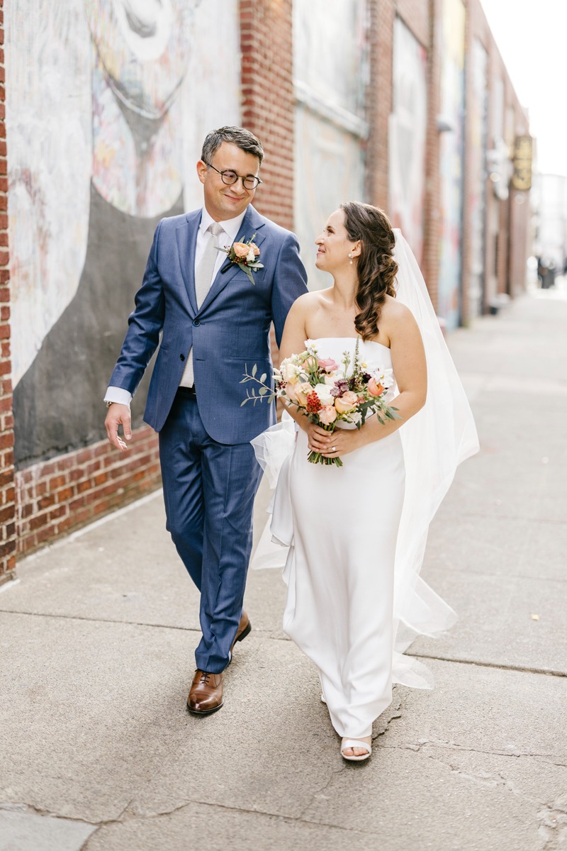 groom in blue suit