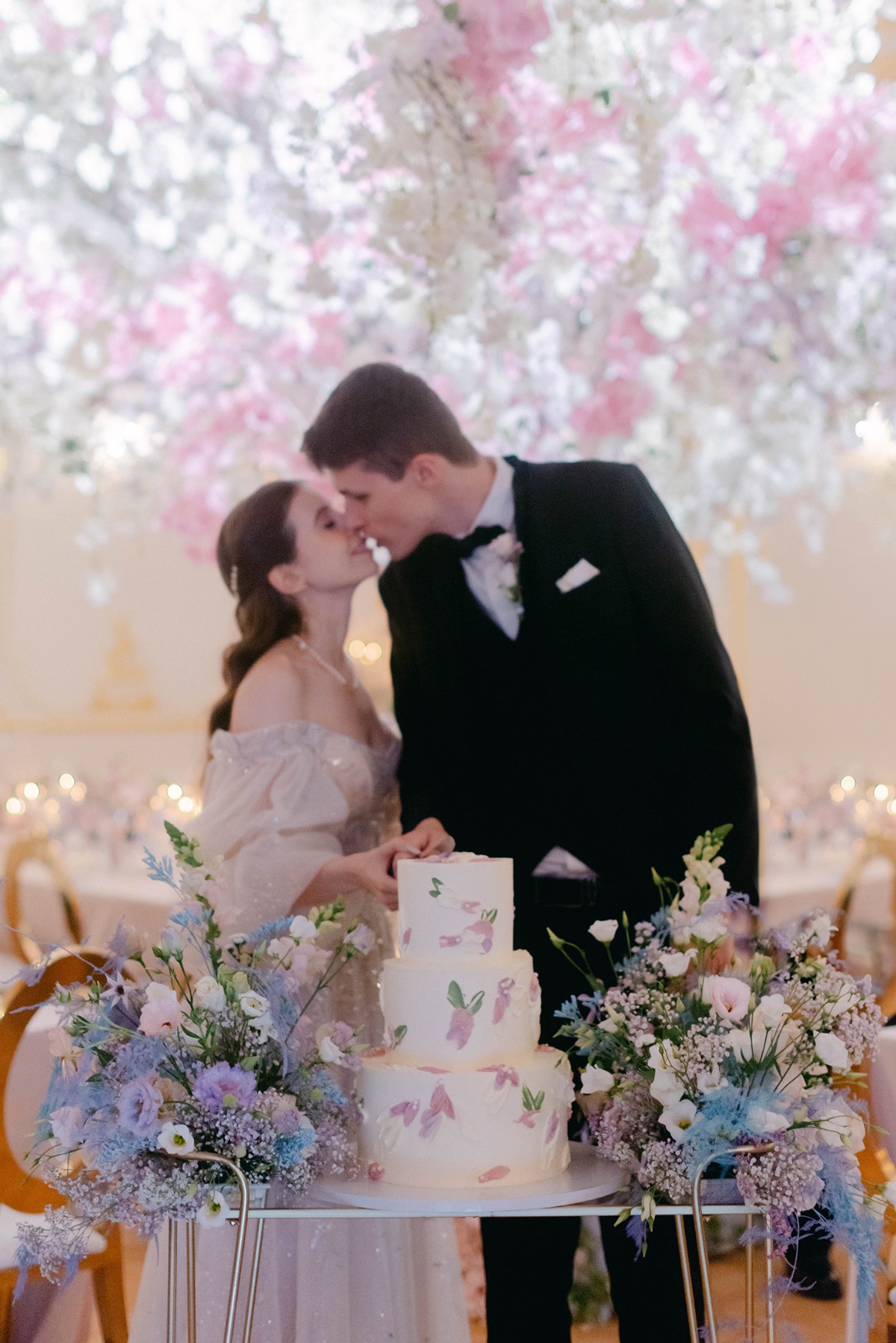 cake cutting at pastel wedding