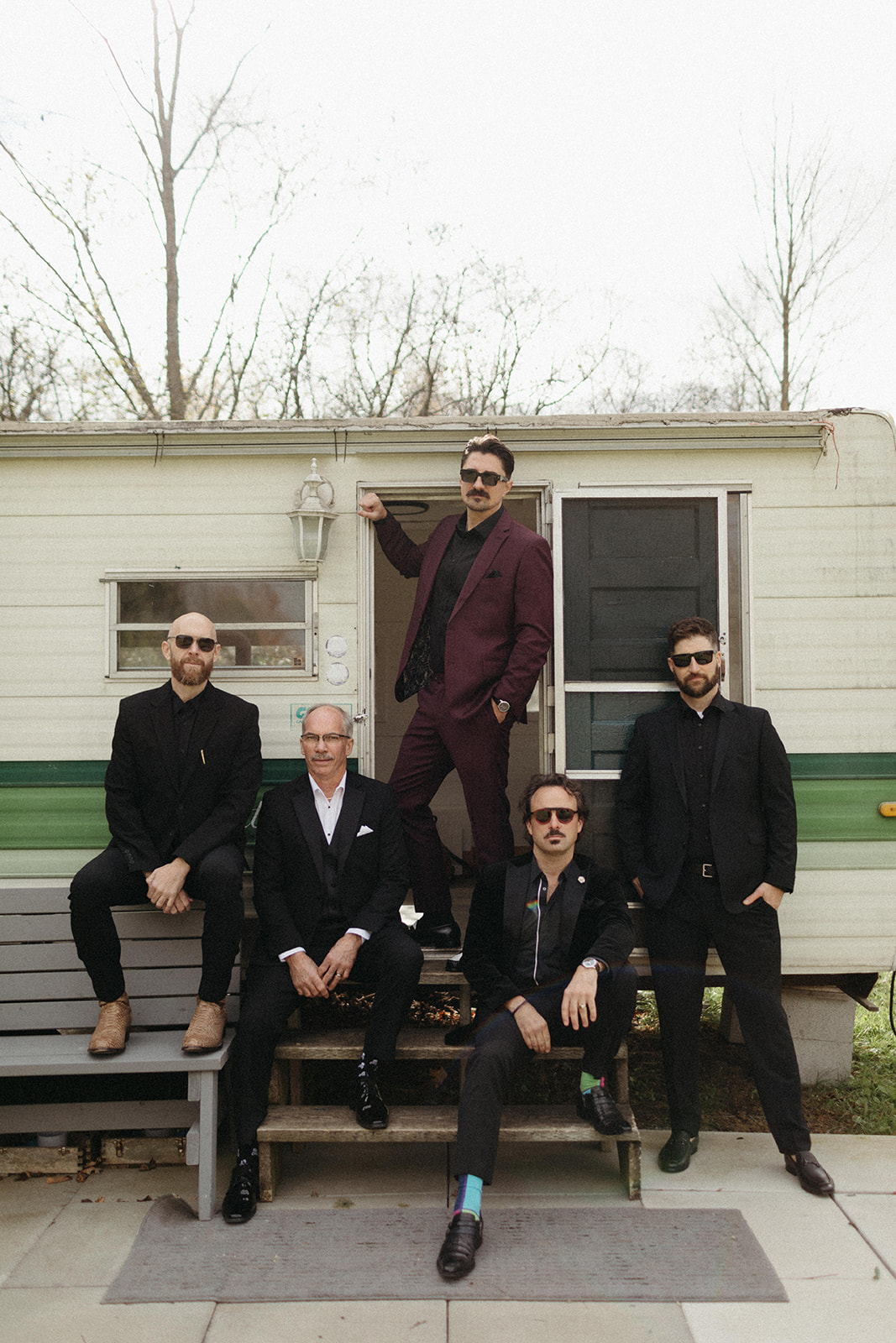 maroon groom suit with black shirt