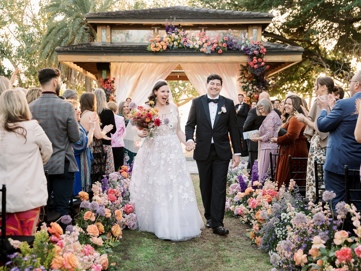 asymmetrical floral installation wedding ceremony