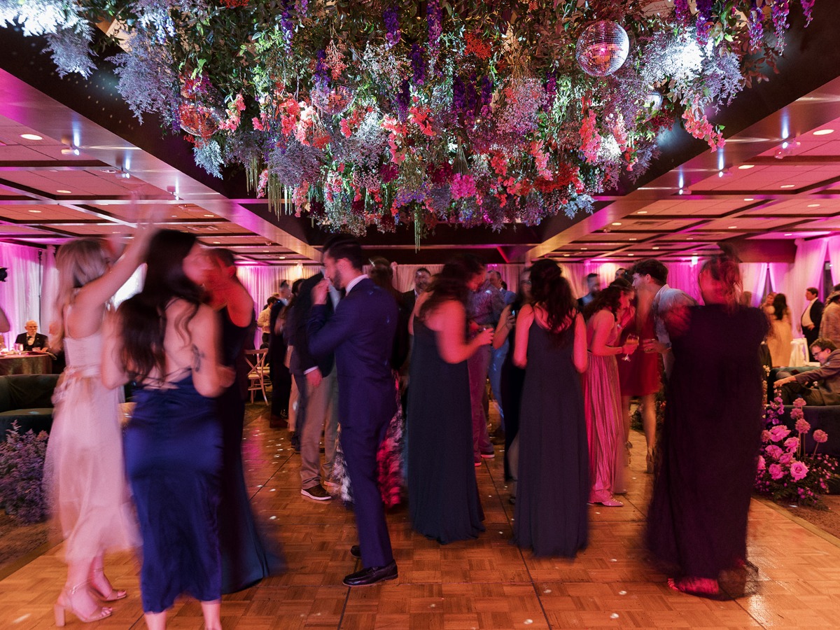 tropical disco floral installation wedding reception