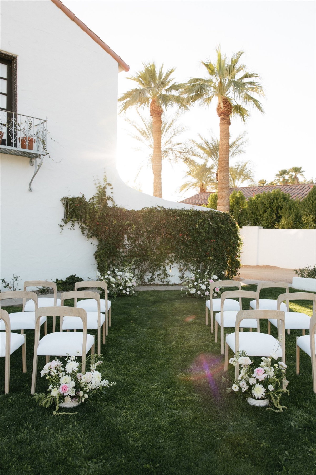 pink white and light wood wedding ceremony design