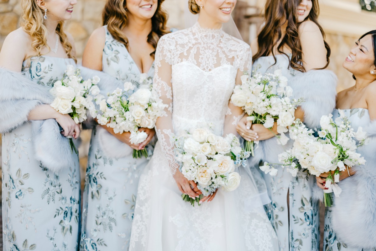 blue bridesmaids dresses with blue fur shawls