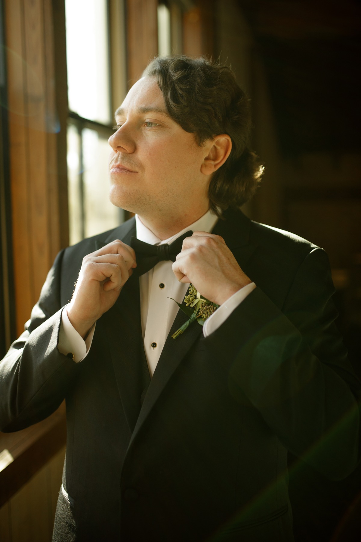 groom in tux