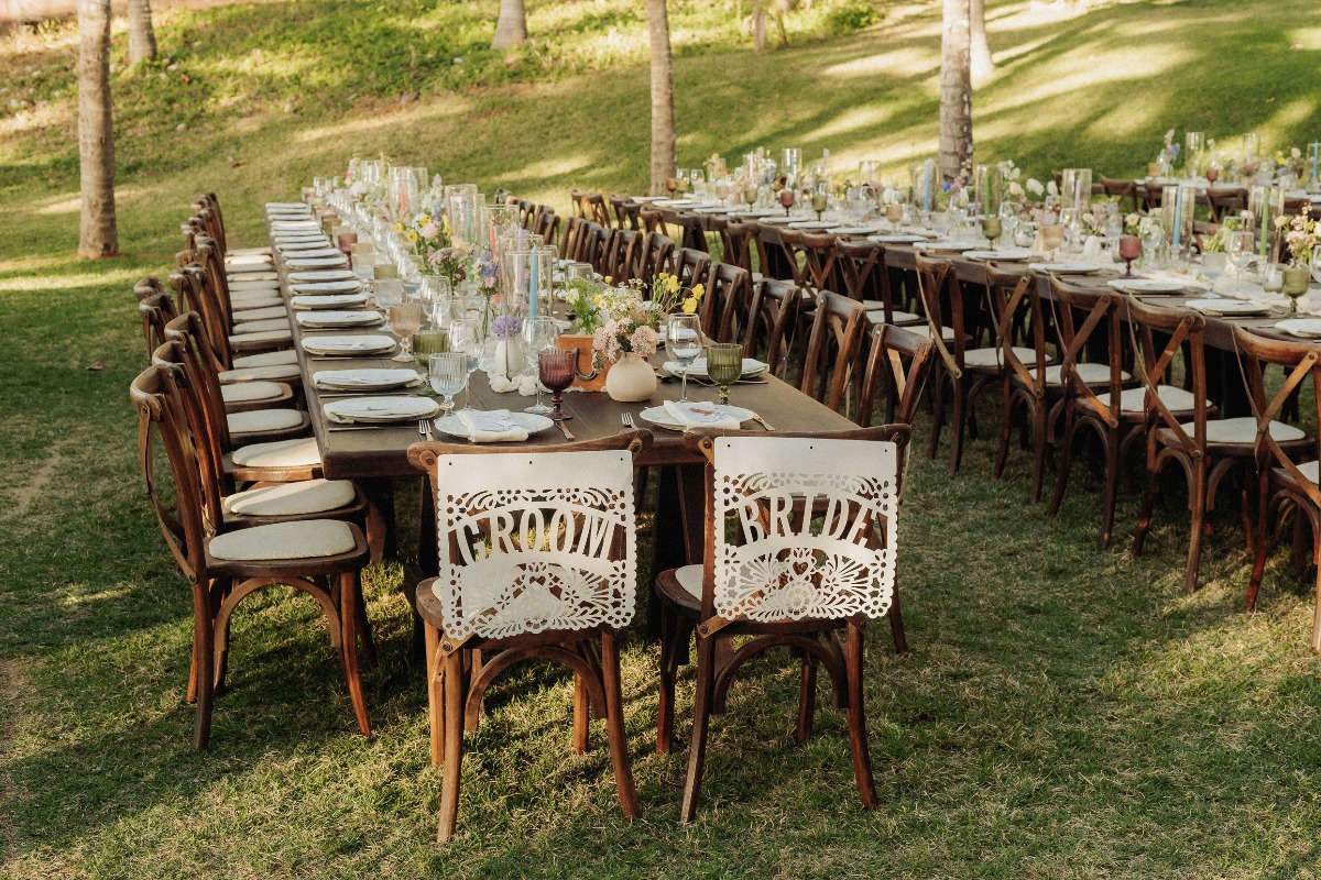 bride and groom mexican paper sign