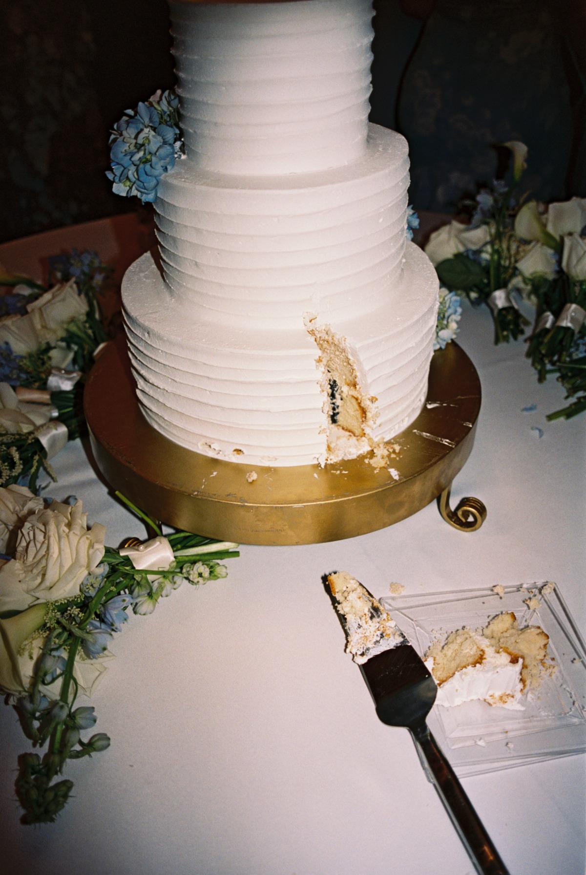 white cake with blue accents