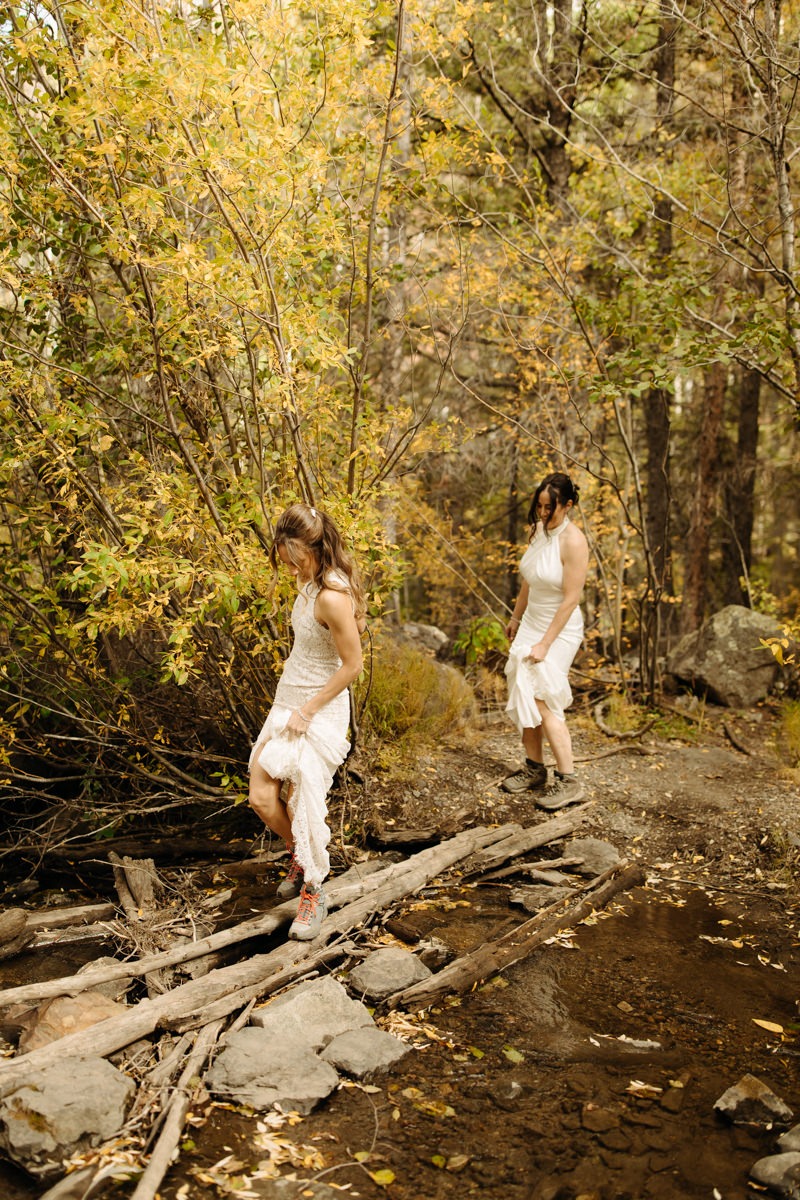 hiking to hidden location for wedding portraits