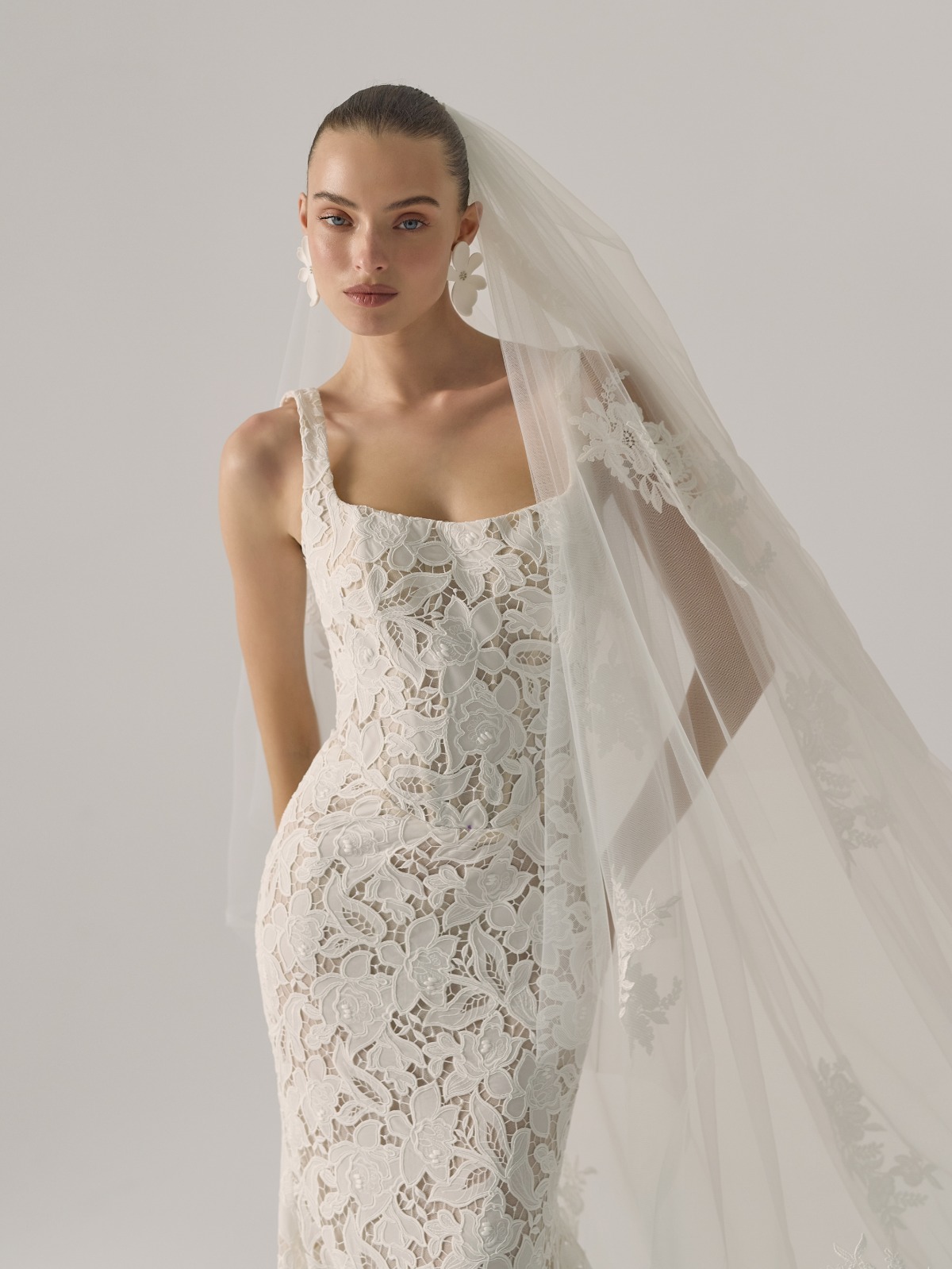 bride wearing tank top wedding dress with lace