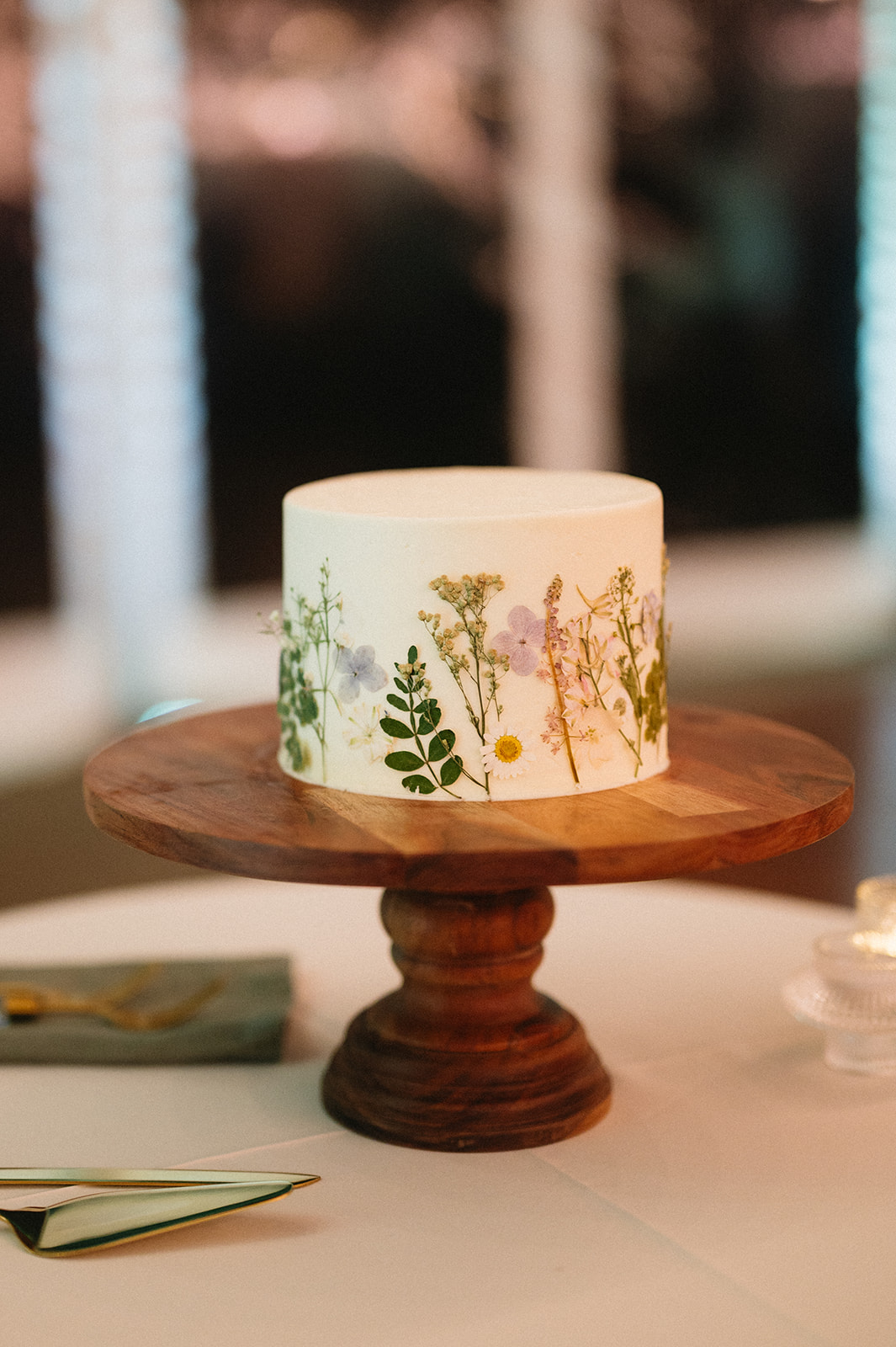 pressed wildflower wedding cake