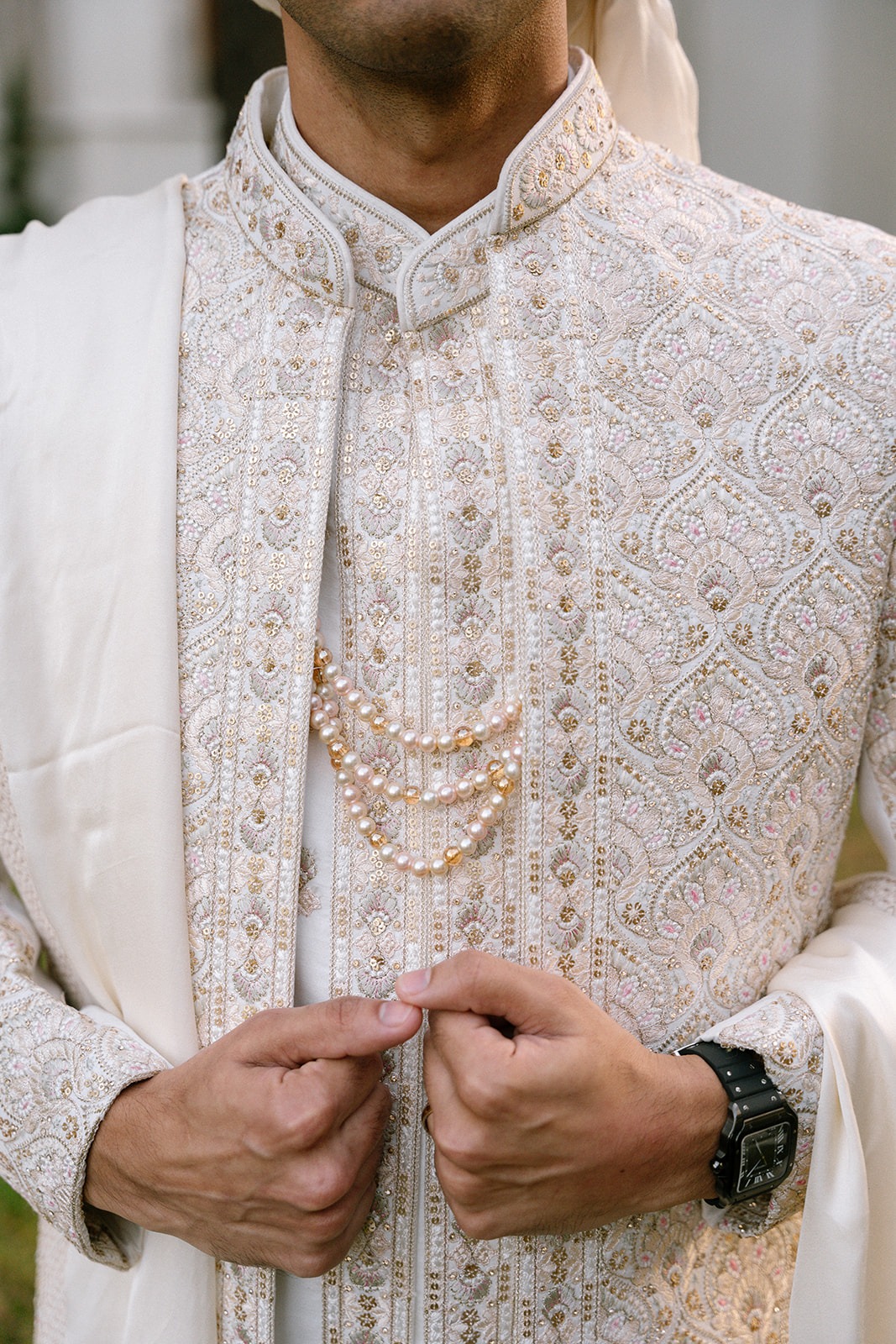 groom with pearl necklace