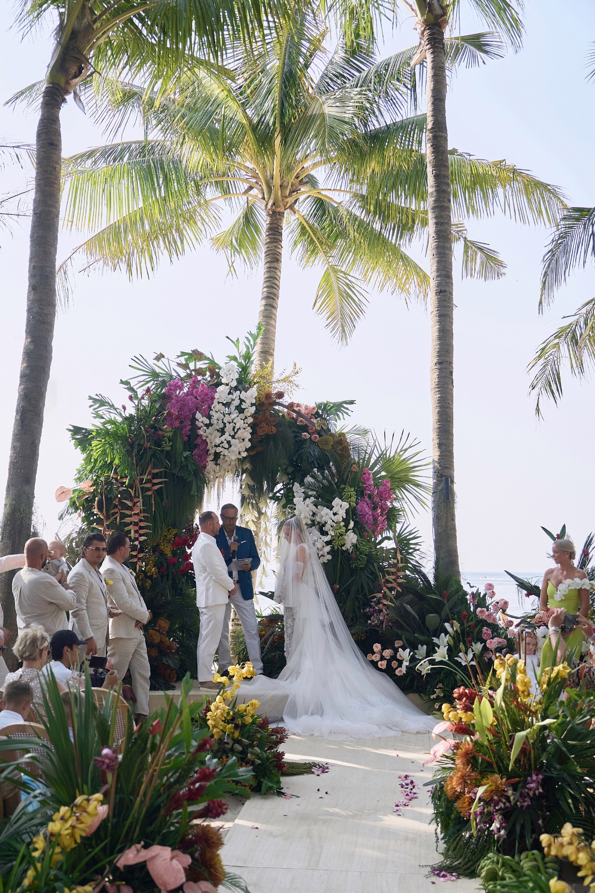 lush tropical floral arch