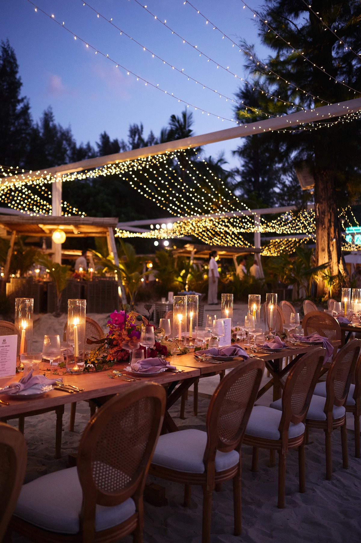 nighttime beach wedding reception