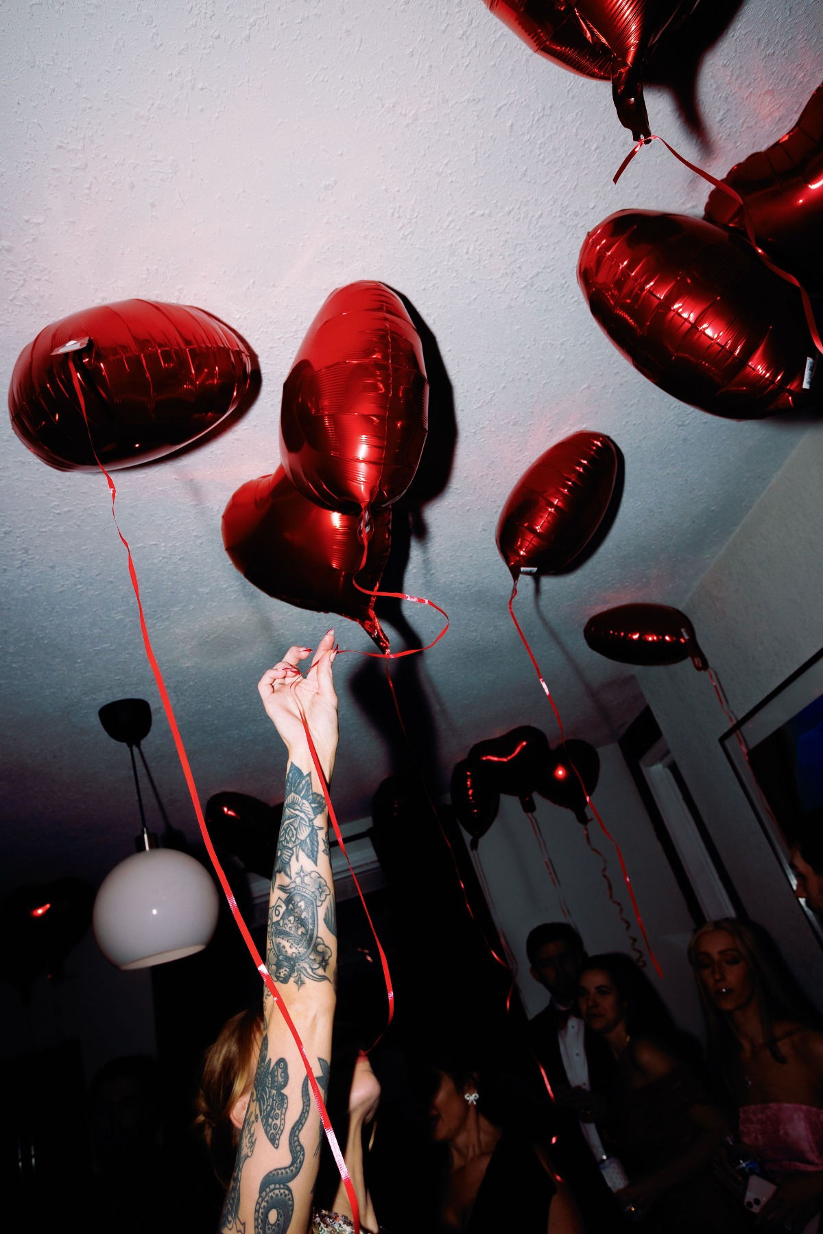 red heart balloons for wedding reception