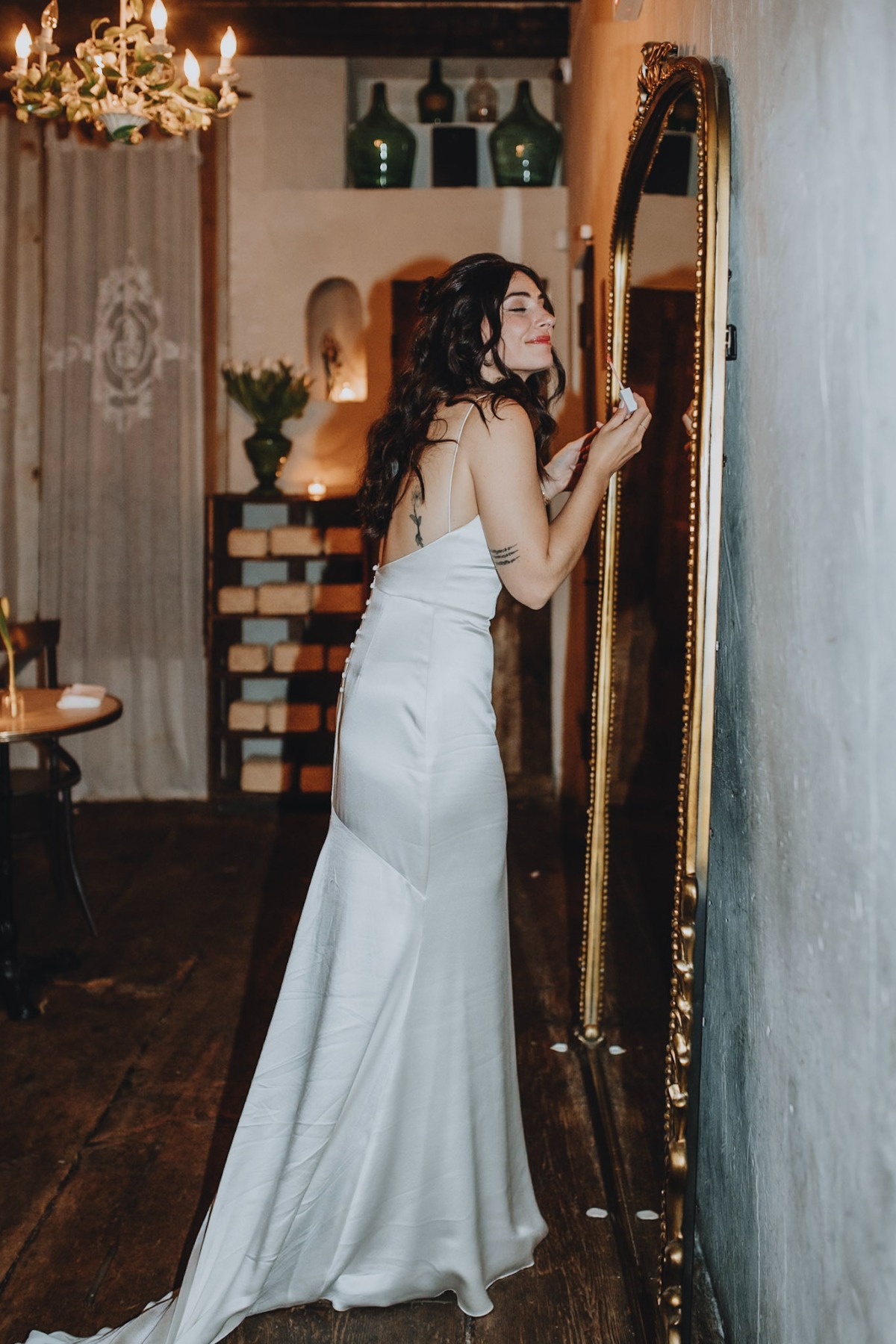 gold leaning mirror