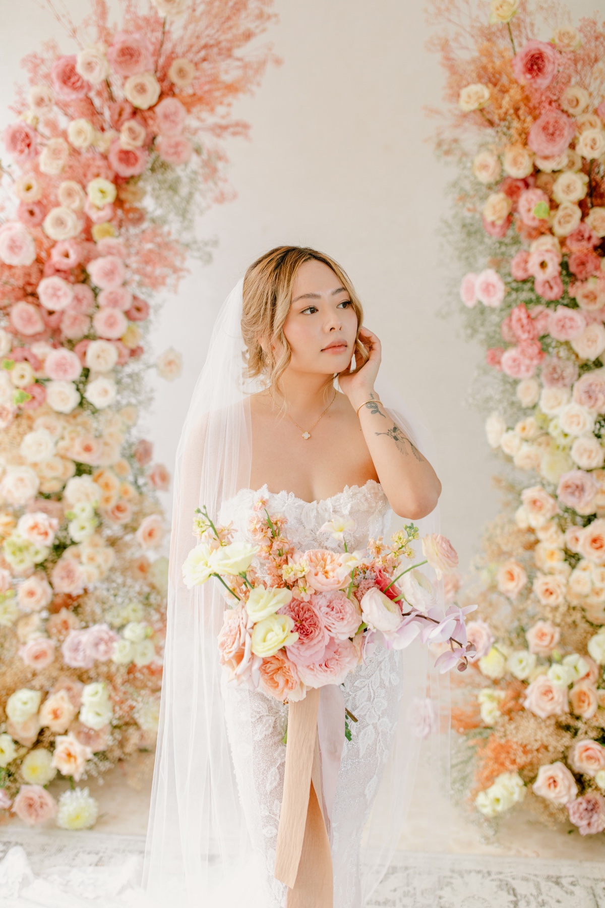 bride with pastel flowers