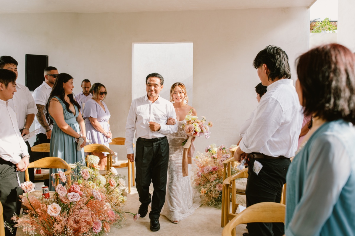 father walking bride down the aisle in tulum
