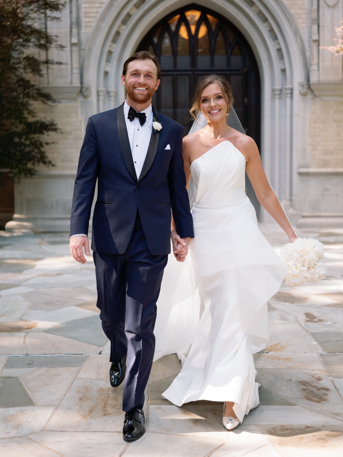 groom in blue tuxedo