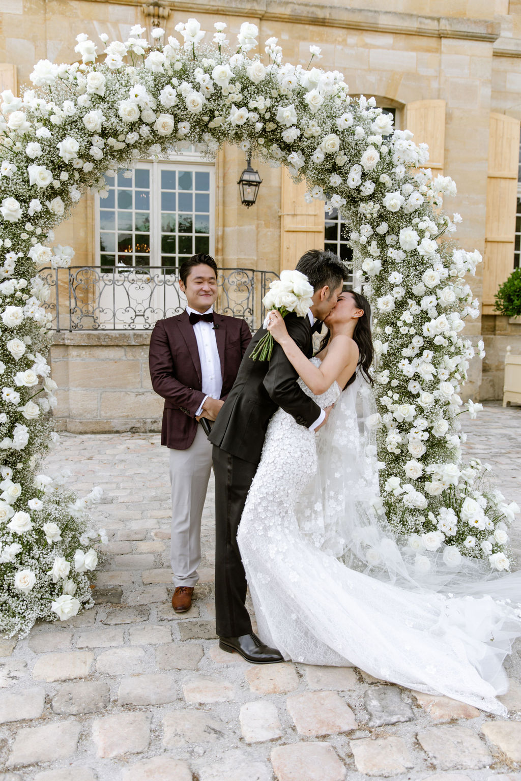 white rose and babys breath floral arch