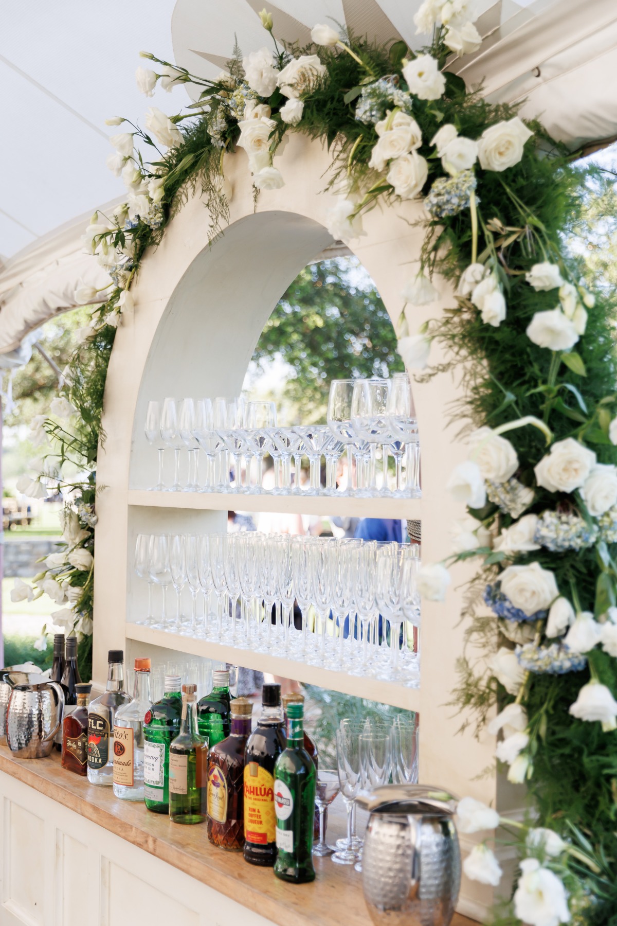 floral arch for wedding bar