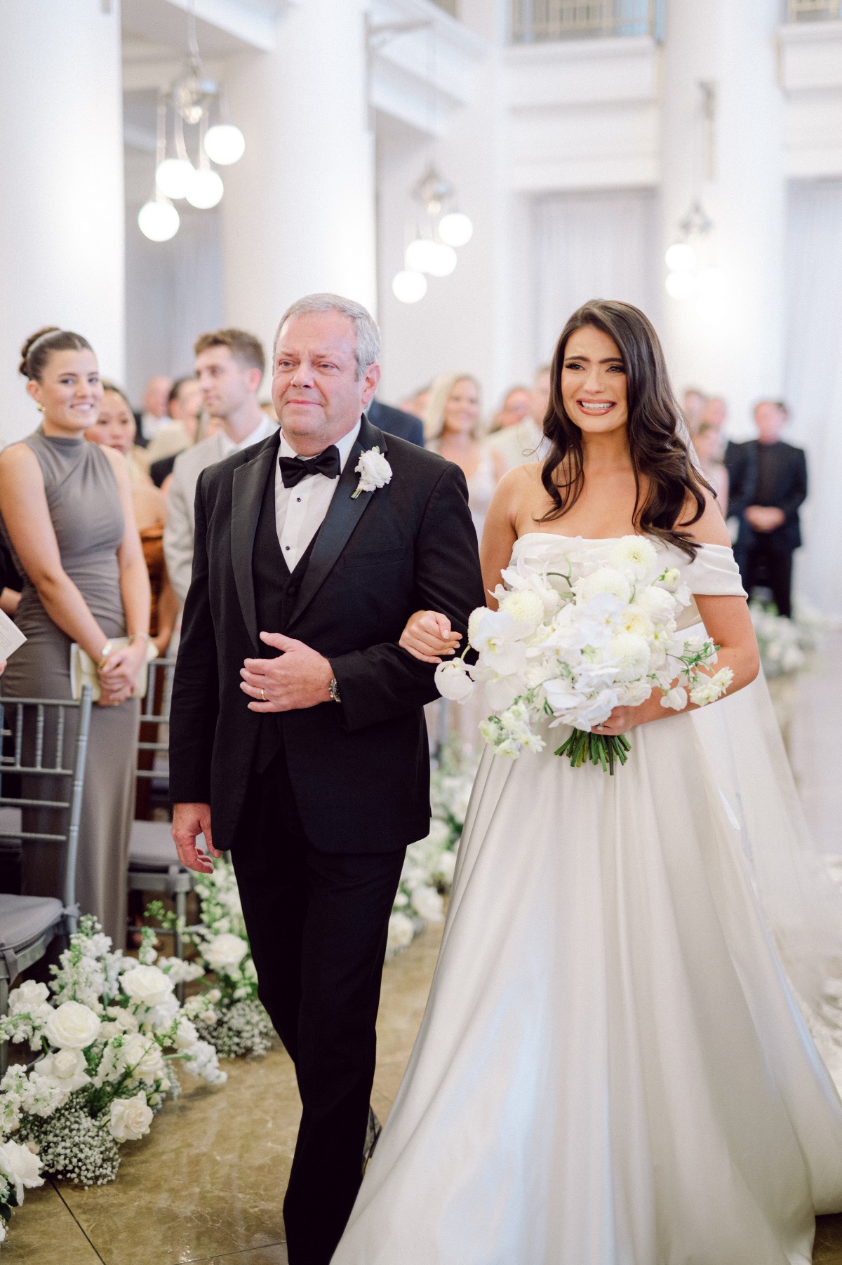 father of the bride walking her down the aisle