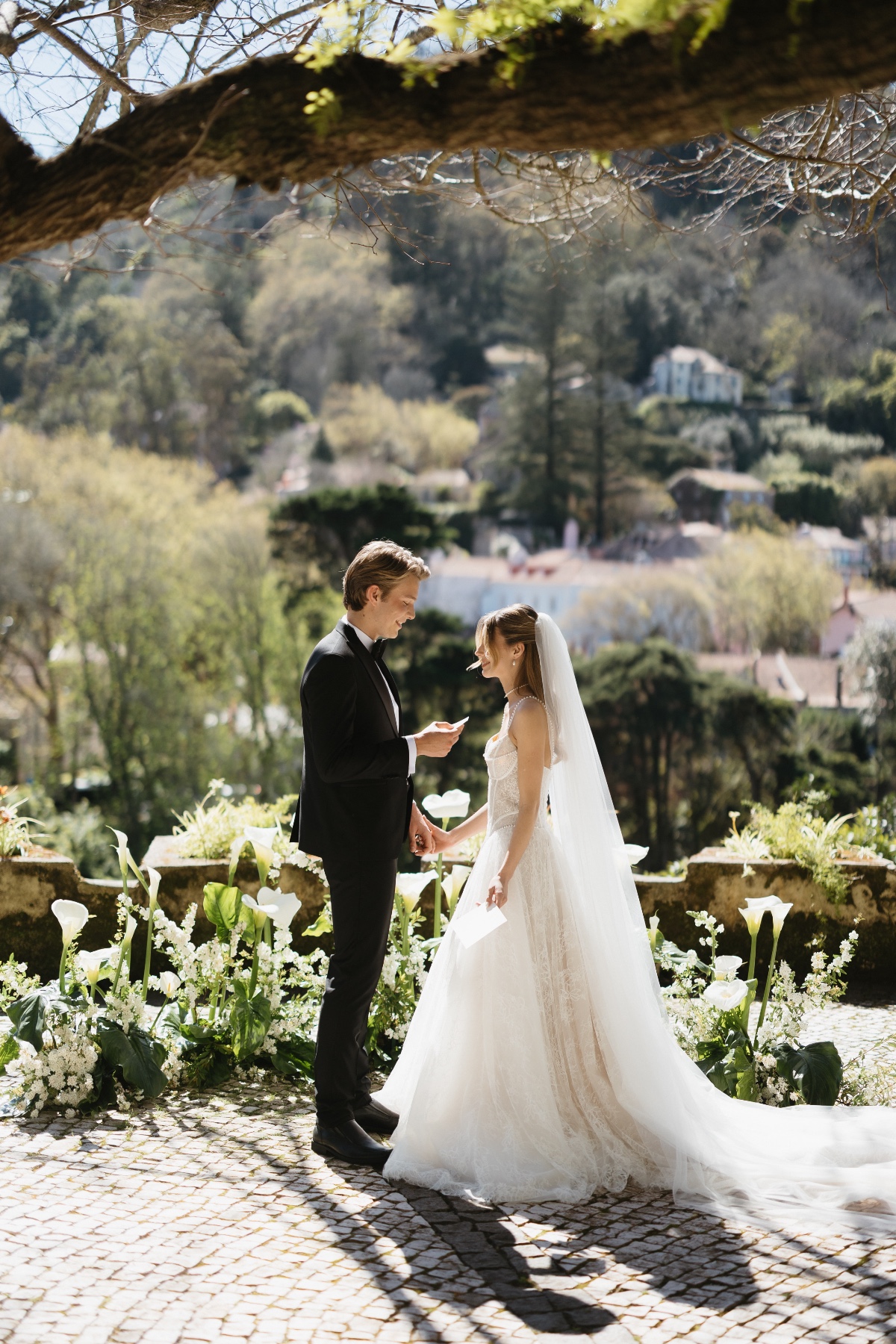 outdoor green and white wedding ceremony