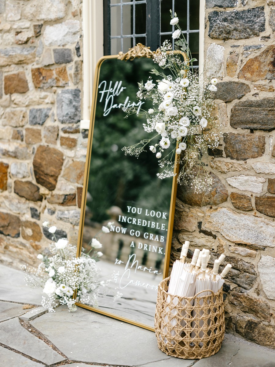 mirrored selfie welcome sign