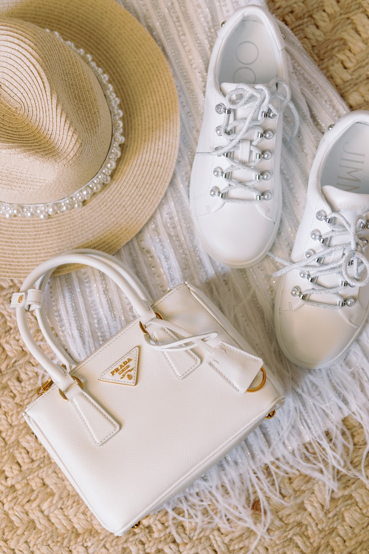 white sneakers with pearl details