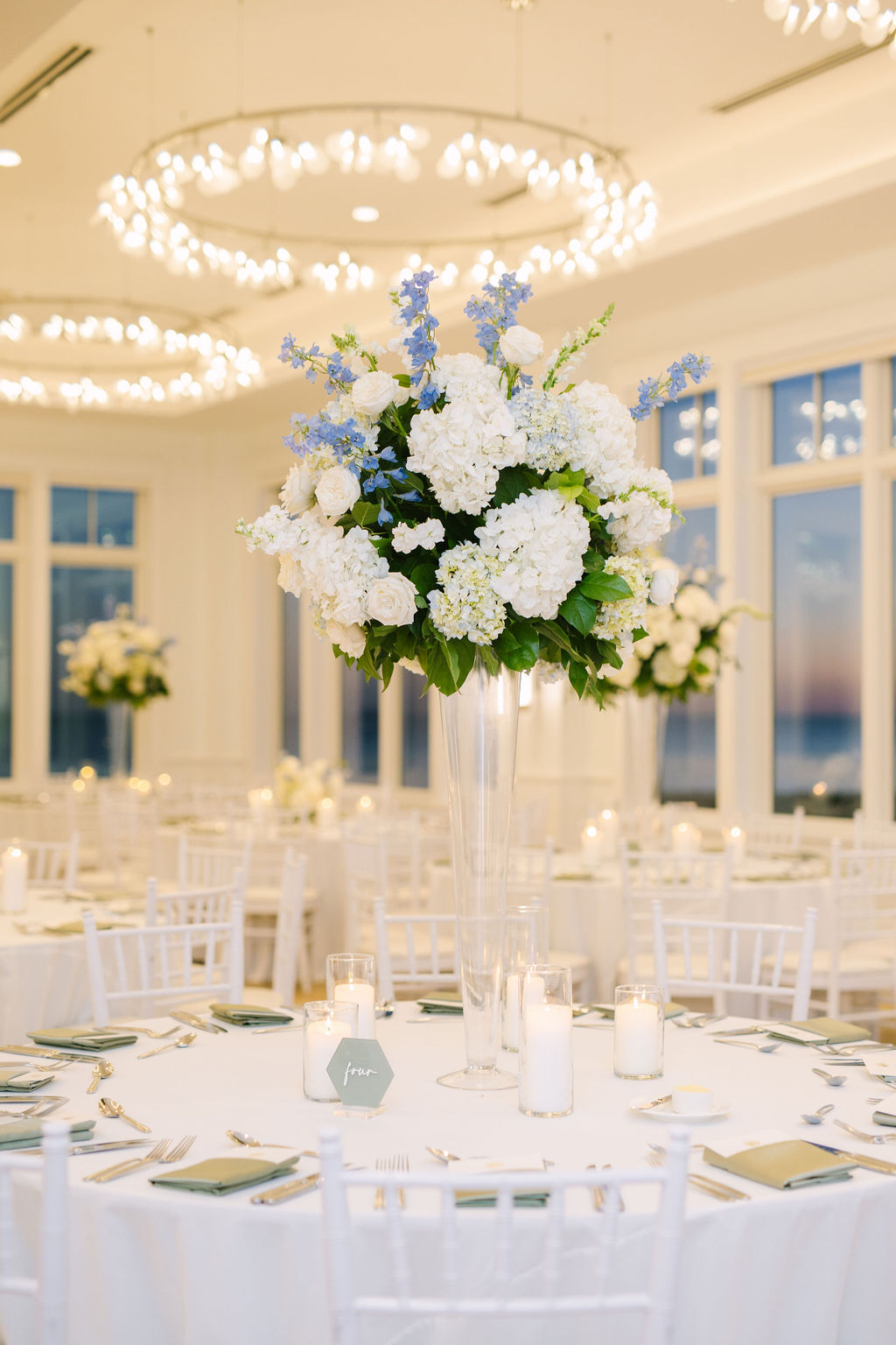 blue and white hydrangea centerpiece clear vase