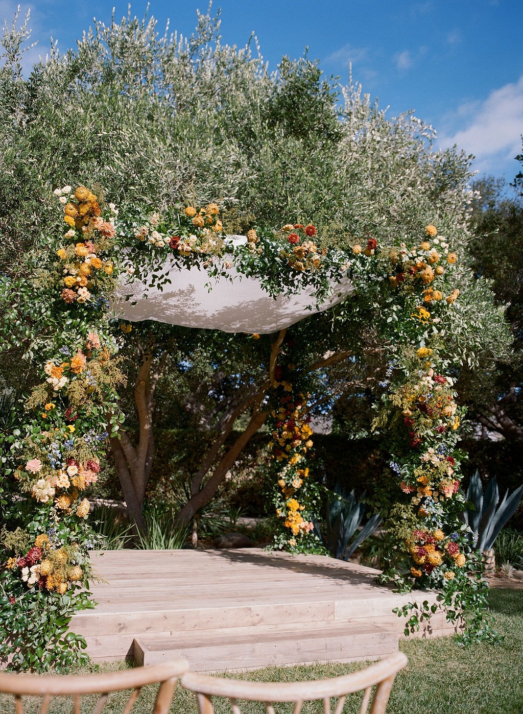 orange and red floral installation