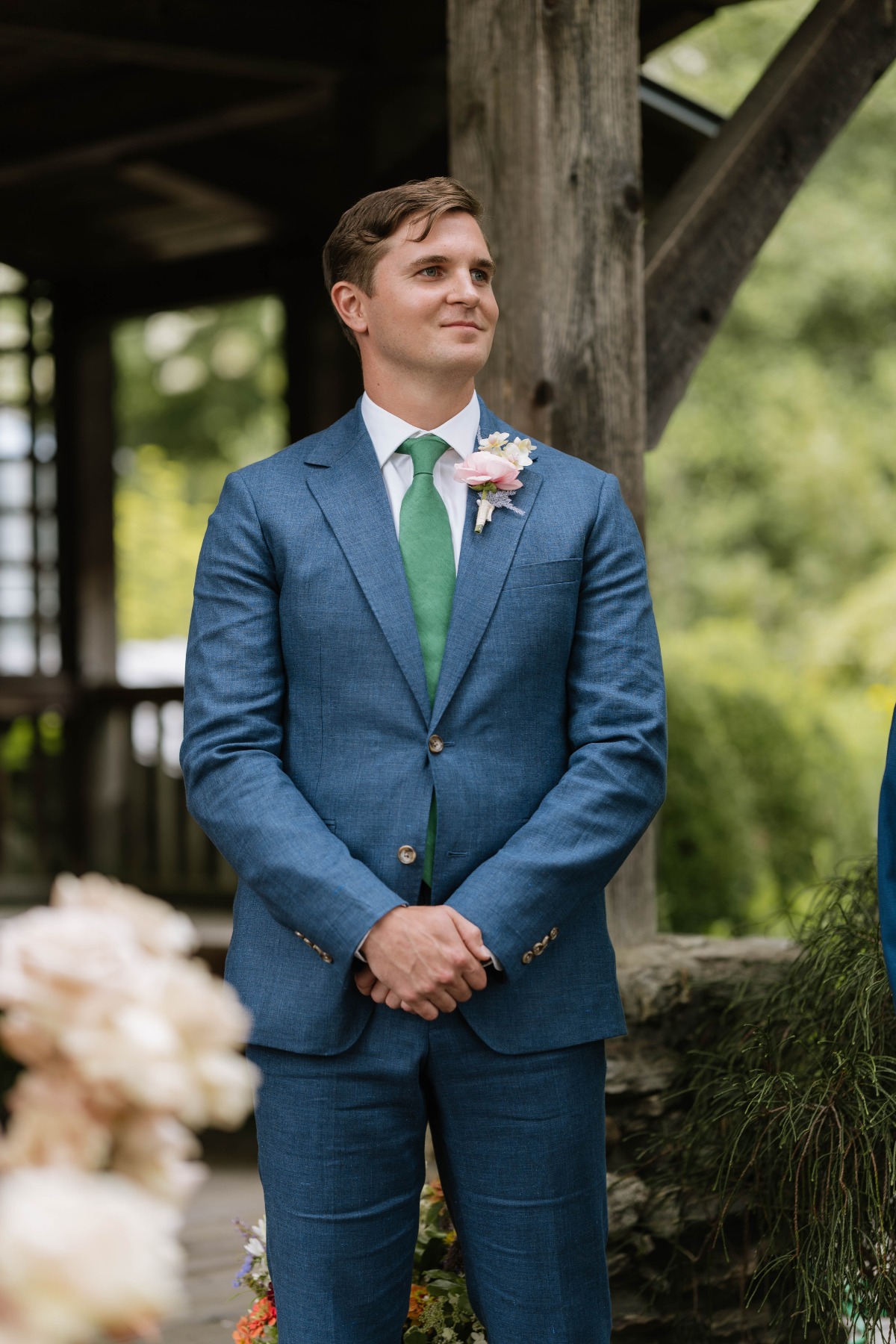 groom in blue suit