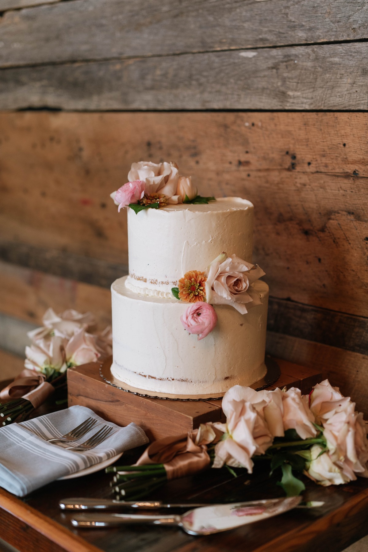 simple two tiered buttercream wedding cake