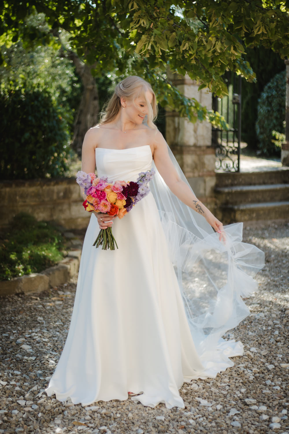 bride with colorful bouquet