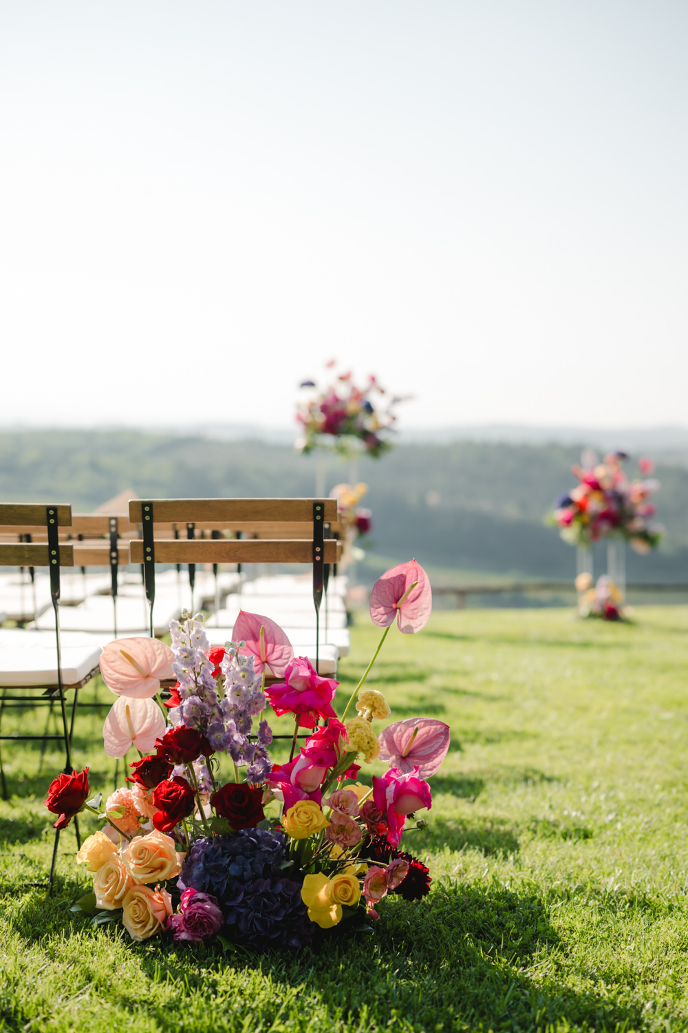 bright wedding ceremony flowers