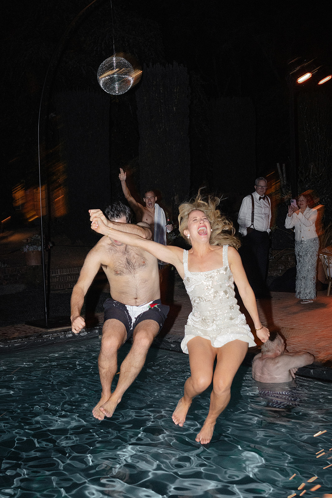 end of wedding jump in the pool