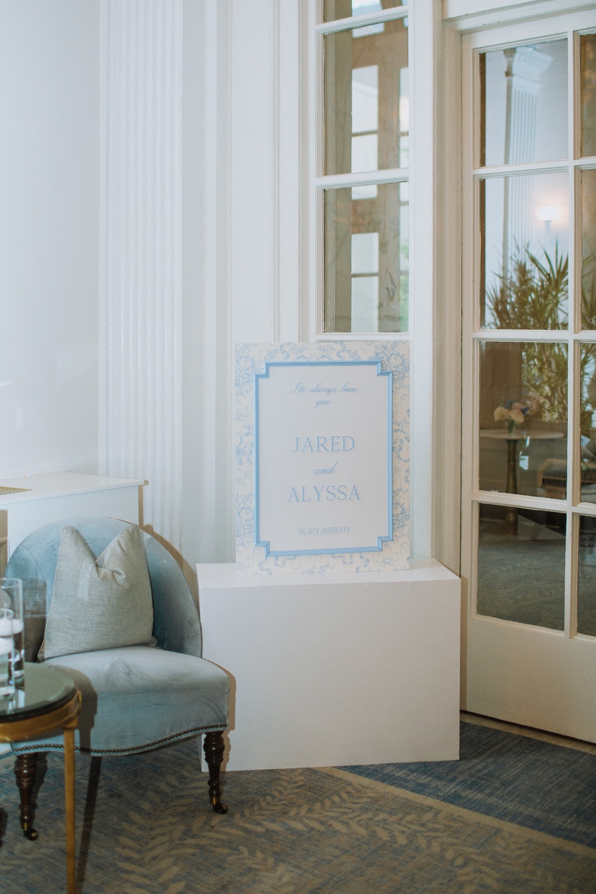 blue and white wedding welcome sign