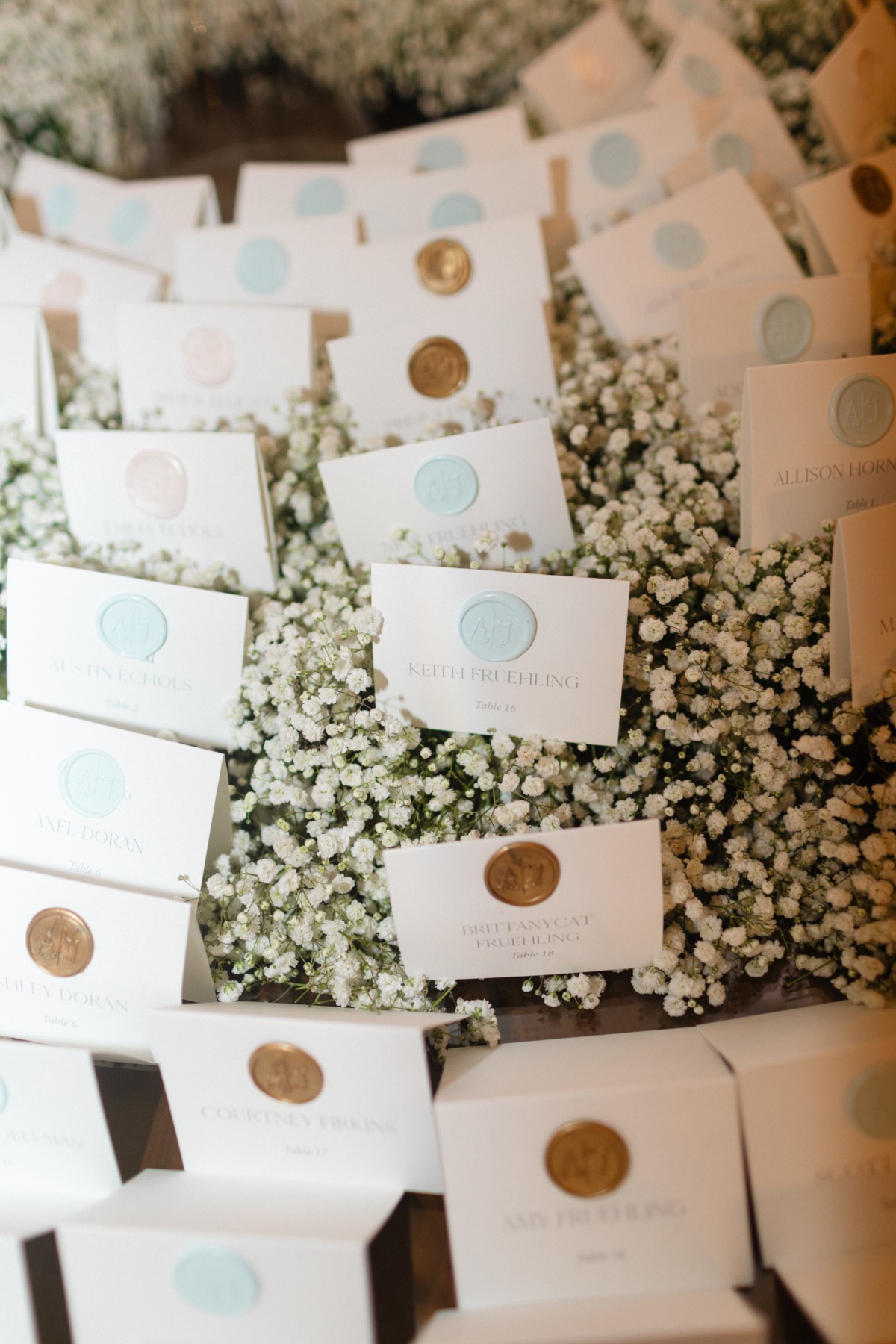 seating cards on baby's breath
