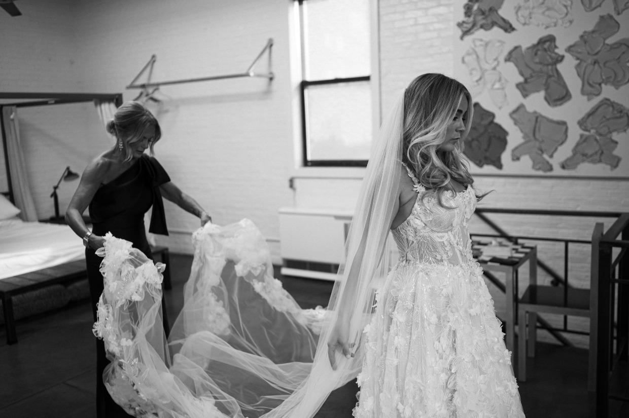 mom helping bride get into galia lahav fabiana gown