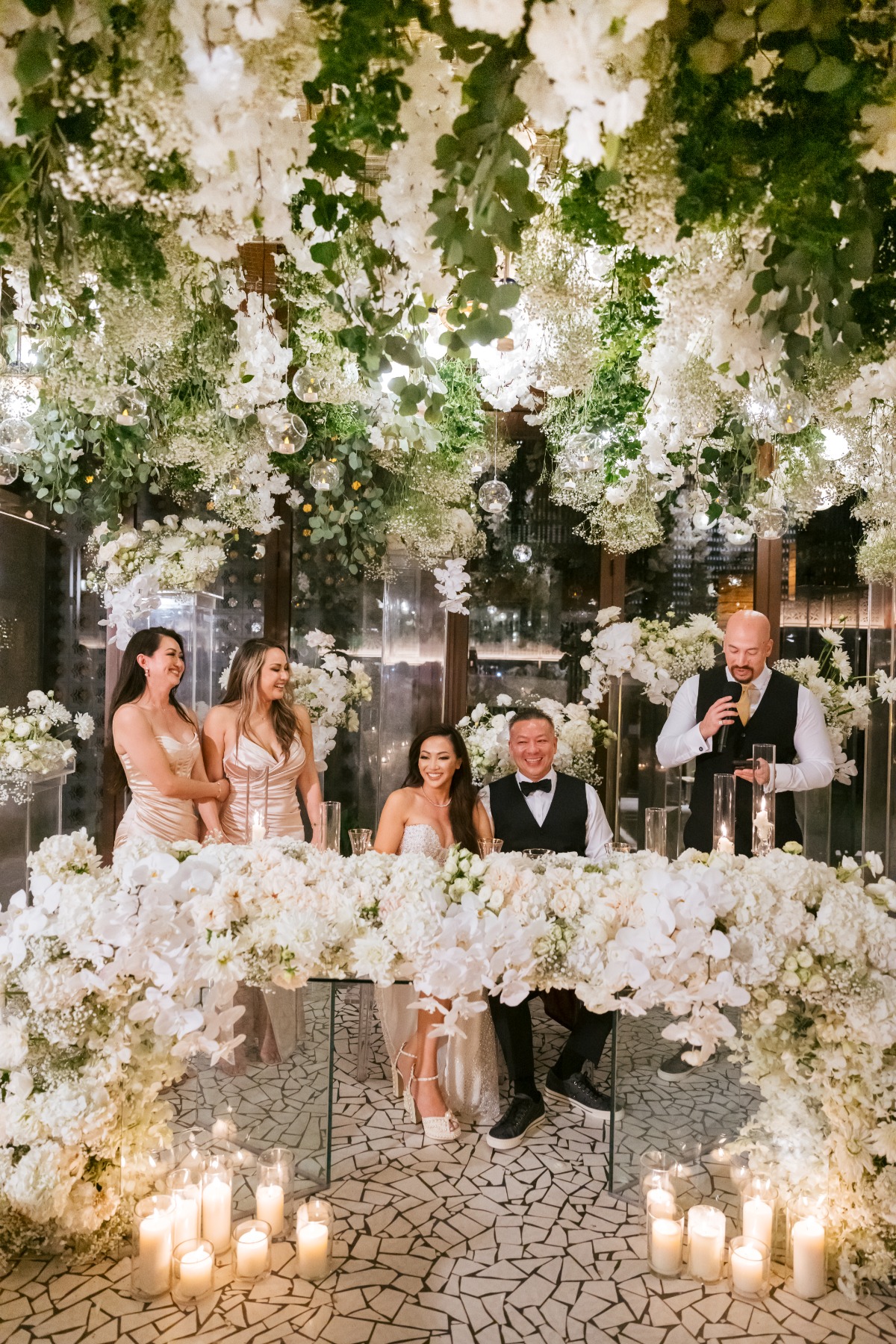 large white floral installation for sweetheart table