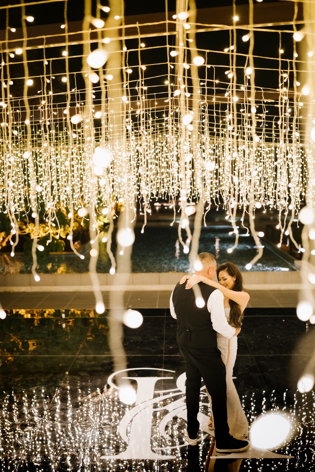 hanging waterfall string lights over dance floor