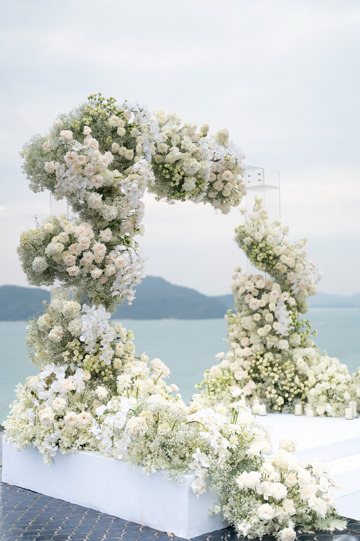 asymmetrical floating floral arch