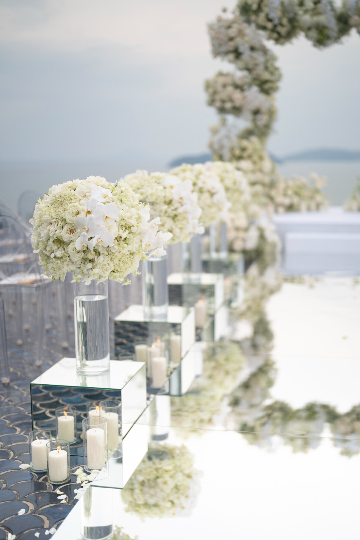 ball of white roses aisle floral arrangement