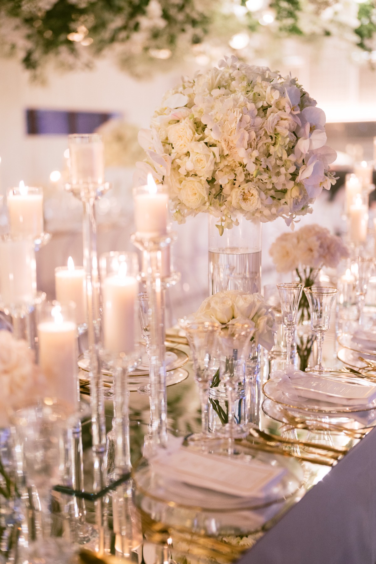 clear candleholders with white candles