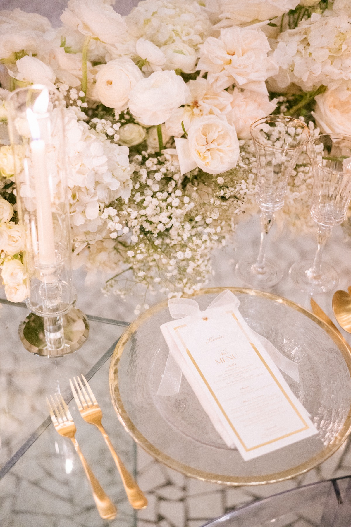 gold rimmed clear place settings