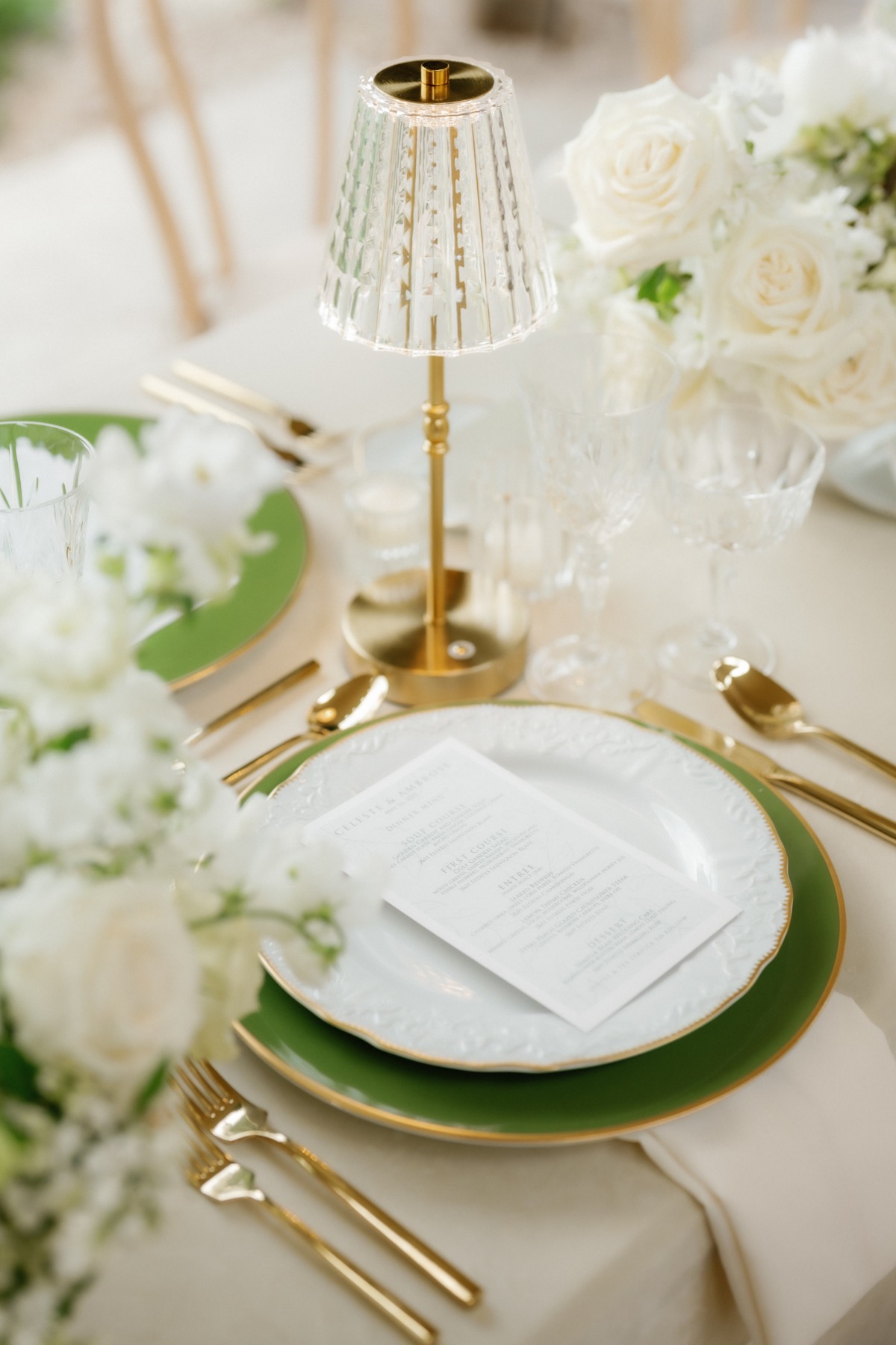 green gold and ivory place settings at wedding