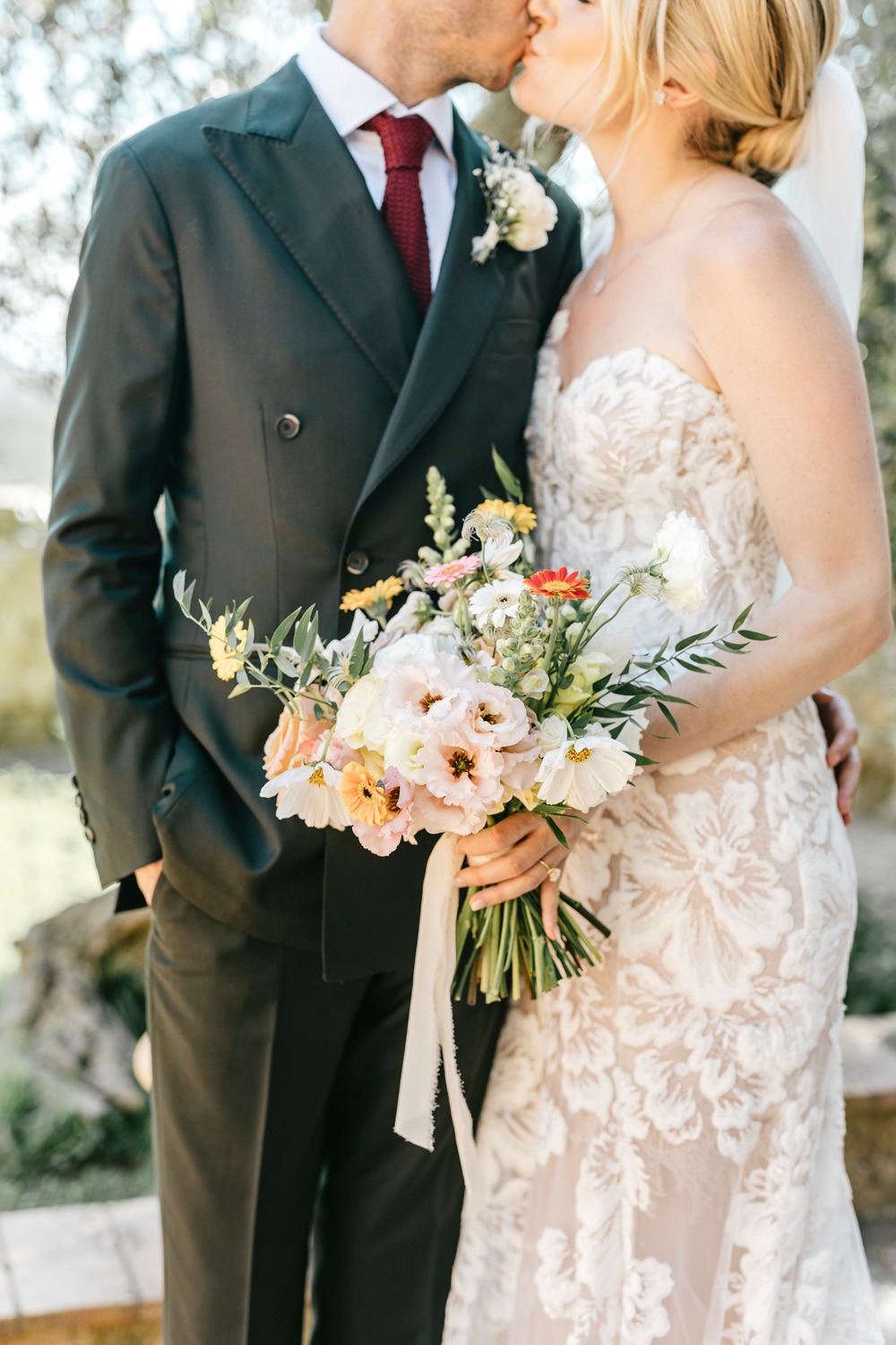 groom in green suit