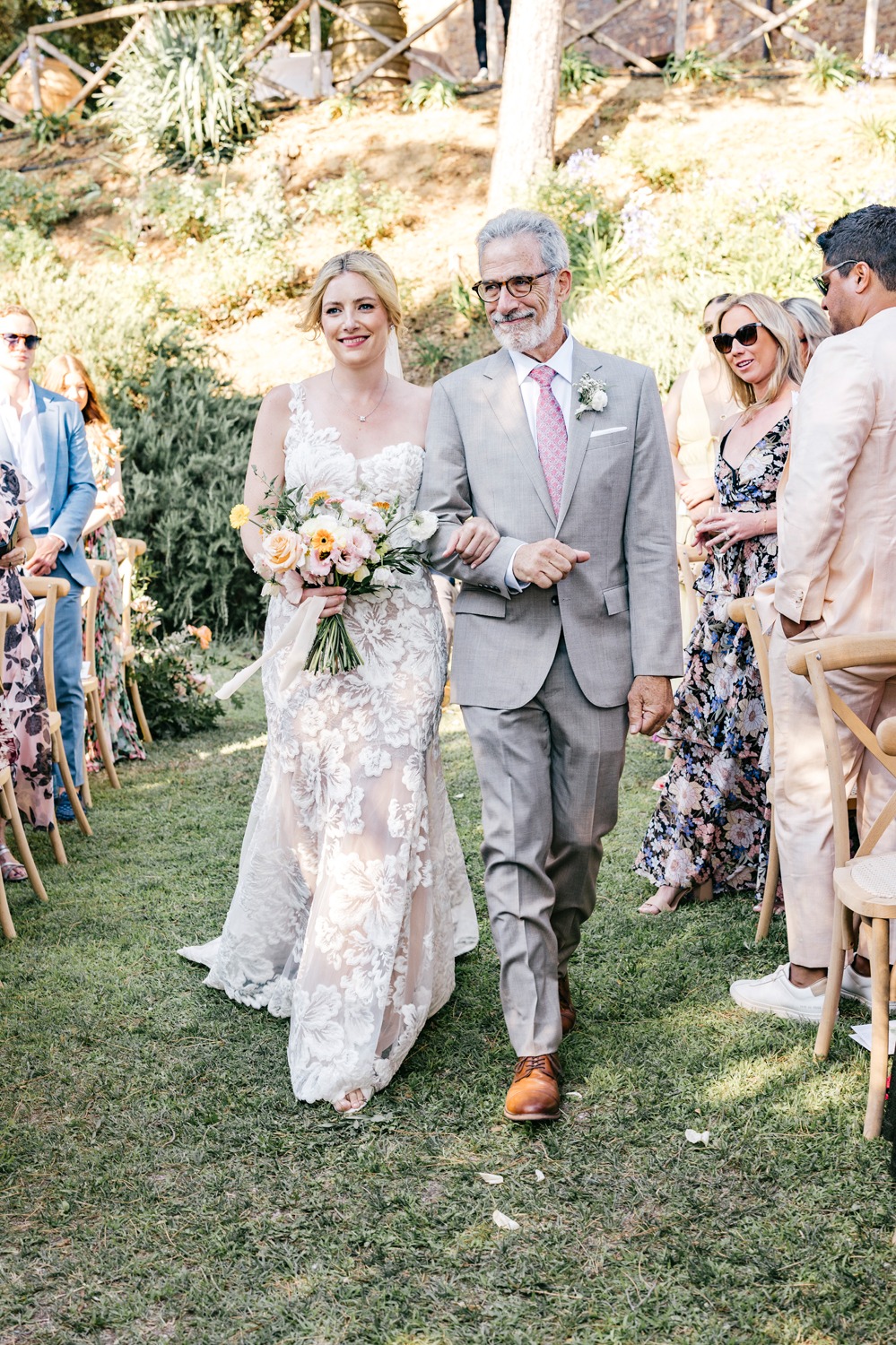father of the bride in a gray suit