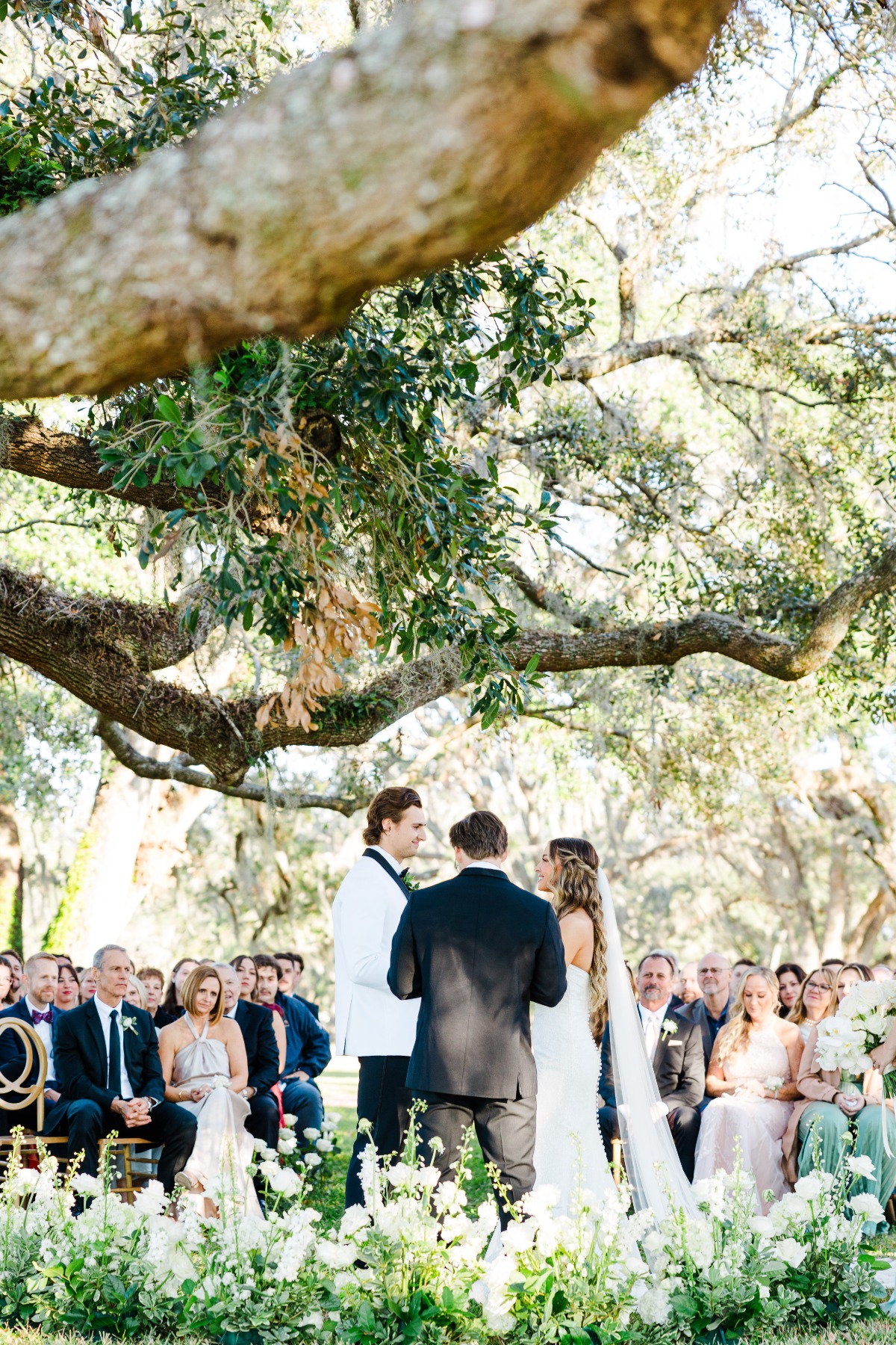 white and greenery ground floral installation