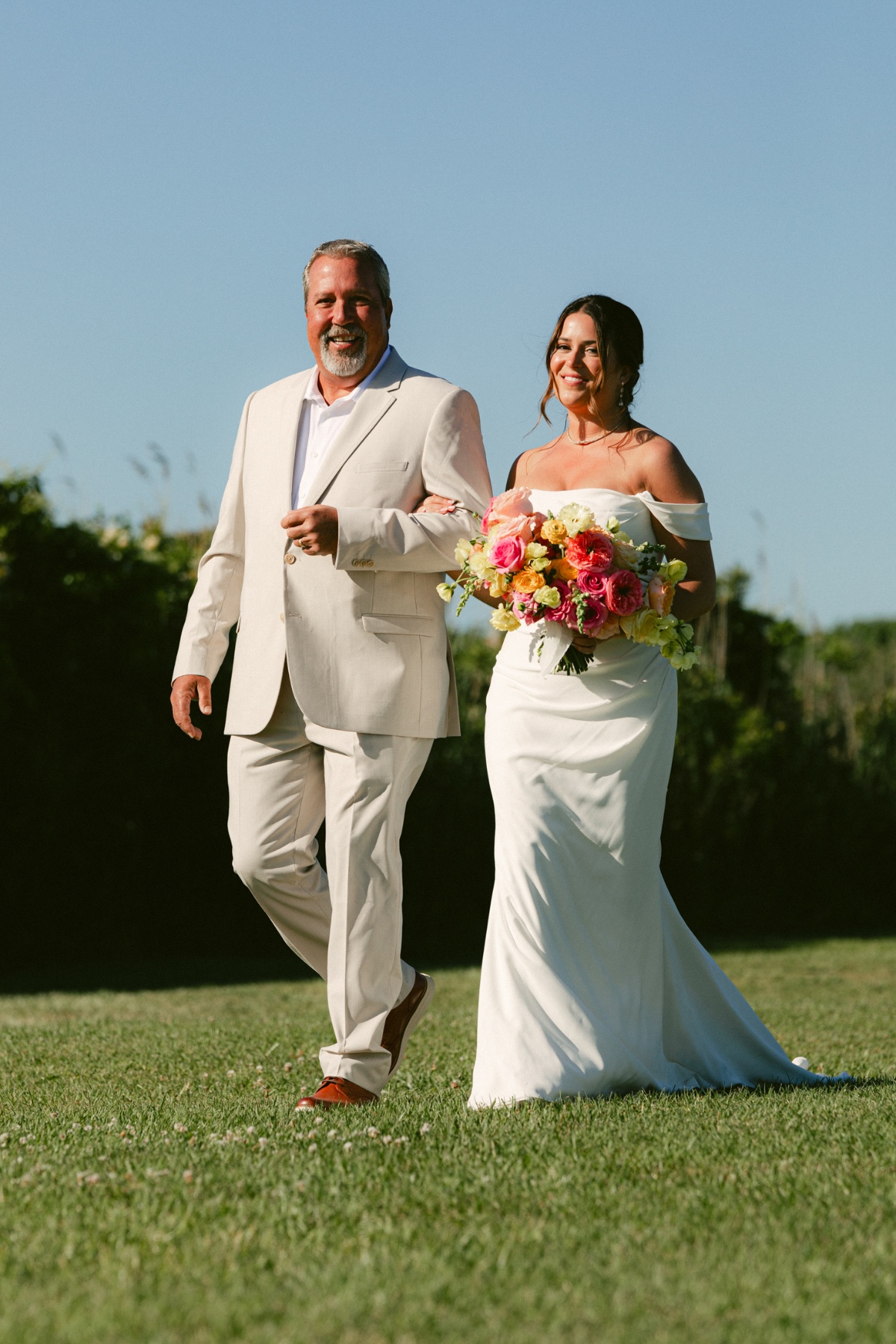 father walking bride down the aisle